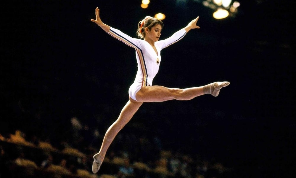 nadia comaneci campeã dos jogos olímpicos nas barras assimétricas