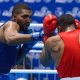 Abner Teixeira fotografado enquanto golpeia um adversário. Mundial masculino de boxe