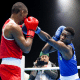 Keno Marley enquanto luta no Mundial de boxe masculino, junto a Luiz Oliveira
