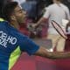 Guia Olímpico de Paris 2024 / ygor coelho em ação nos jogos olímpicos de tóquio badminton
