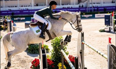Na imagem, Luciana Diniz, do Brasil, saltando obstáculo com seu cavalo Vertigo du Desert.