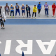 Atletas do salto em distância perfilados durante o Mundial de Atletismo paralímpico de Paris 2023
