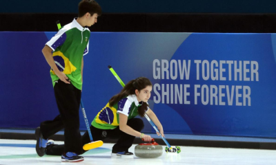 Julia Gentile e Guilherme Melo jogam em partida de curling em Gangwon-2024