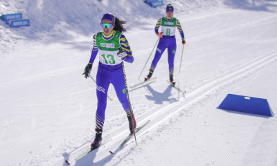Julia Reis e Mariana Silva do Brasil competem no revezamento do esqui cross-country