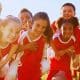 Benefícios do esporte coletivo para crianças