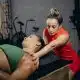 massagem esportiva, recuperação muscular, treino, musculação, corrida, atletas, fisioterapia esportiva, bem-estar
