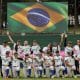 Na imagem, o time Brasil de softbol comemorando melhor campanha nos Jogos Sul-Americanos.