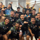 Os brasileiros Rangel Rosa, Márcio Alan e Mikael Cândido festejando no vestiário a vitória (Foto: Instagram @bmtorrelavega)